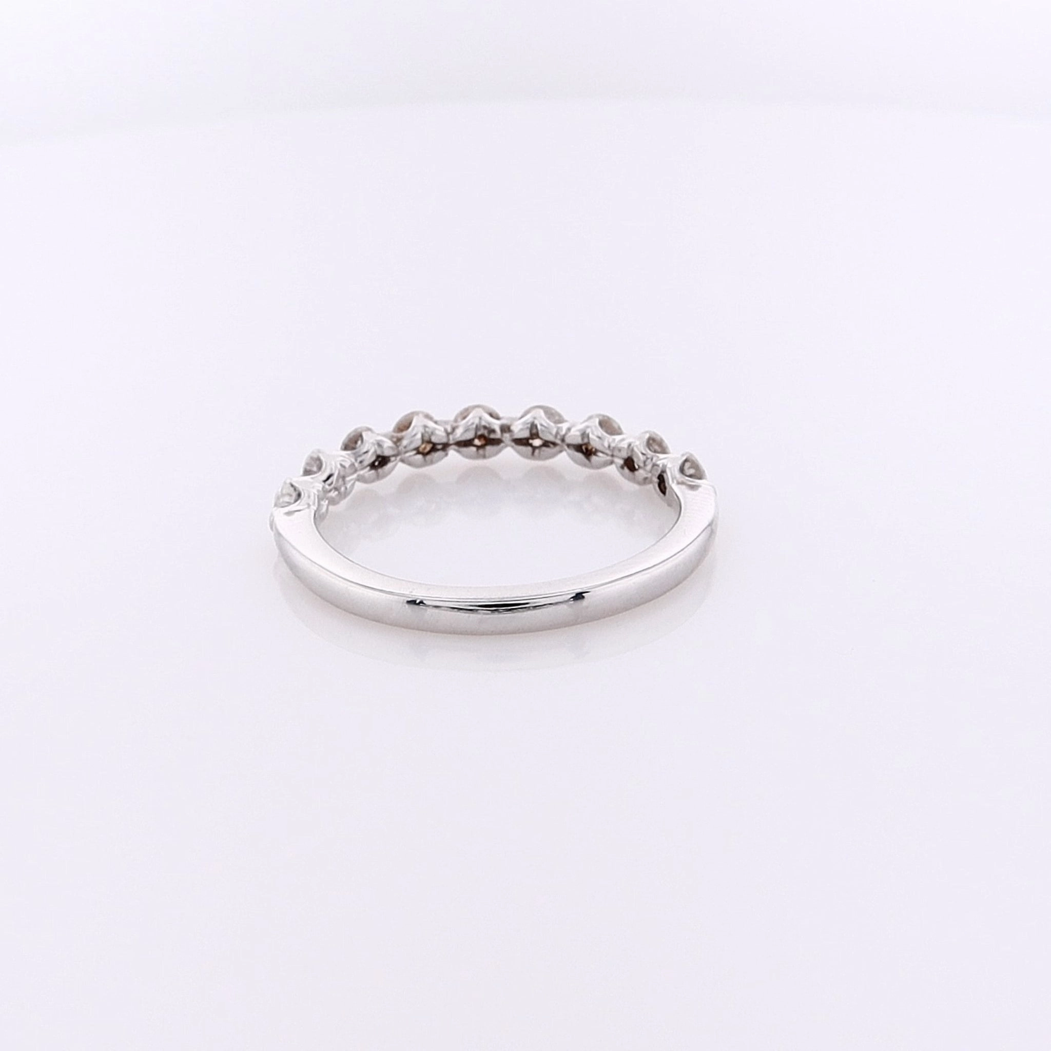 Estate 14 Karat White Gold Shared Prong Diamond Wedding Band