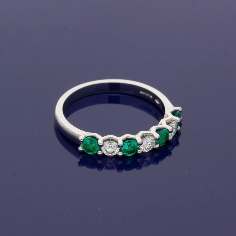 Platinum Emerald and Diamond 7 Stone Ring
