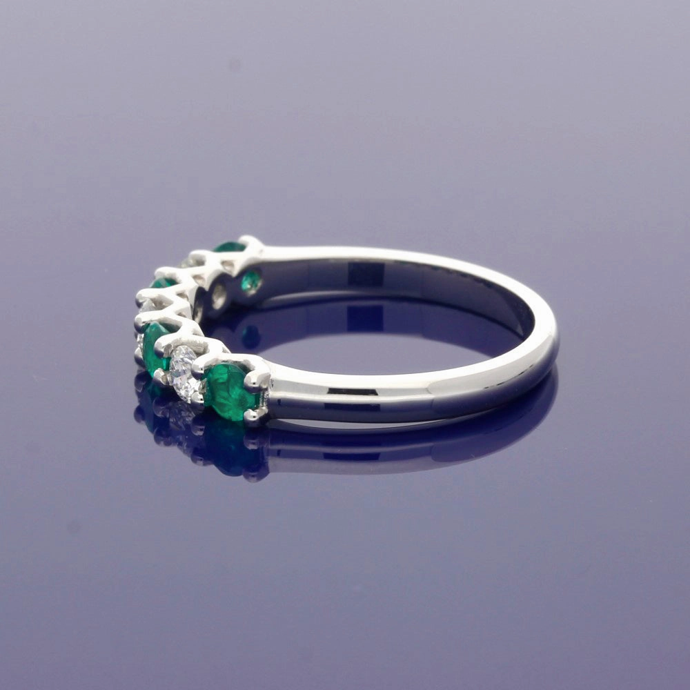 Platinum Emerald and Diamond 7 Stone Ring