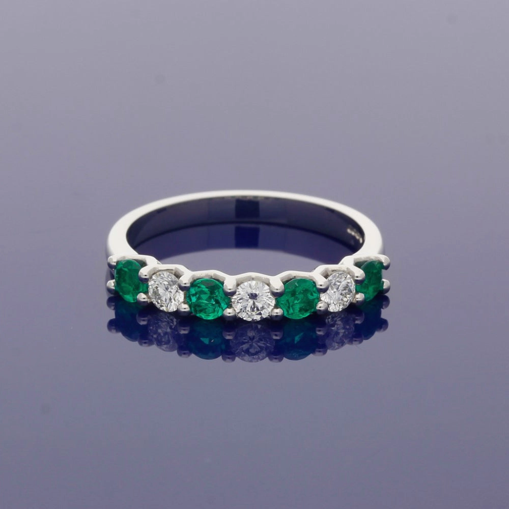 Platinum Emerald and Diamond 7 Stone Ring