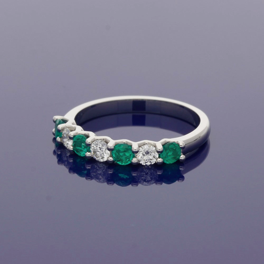 Platinum Emerald and Diamond 7 Stone Ring