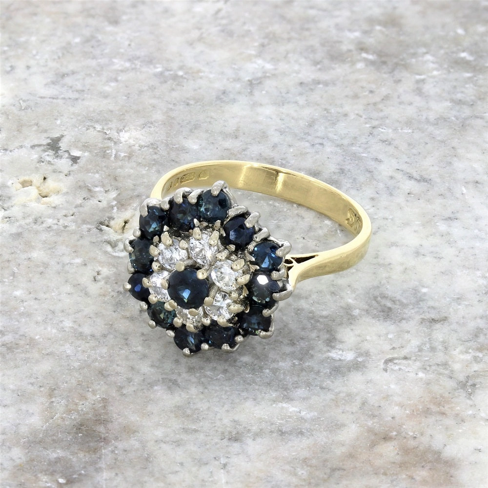 Pre Owned 18ct Yellow Gold Sapphire And 0.25cts Diamond Cluster Ring