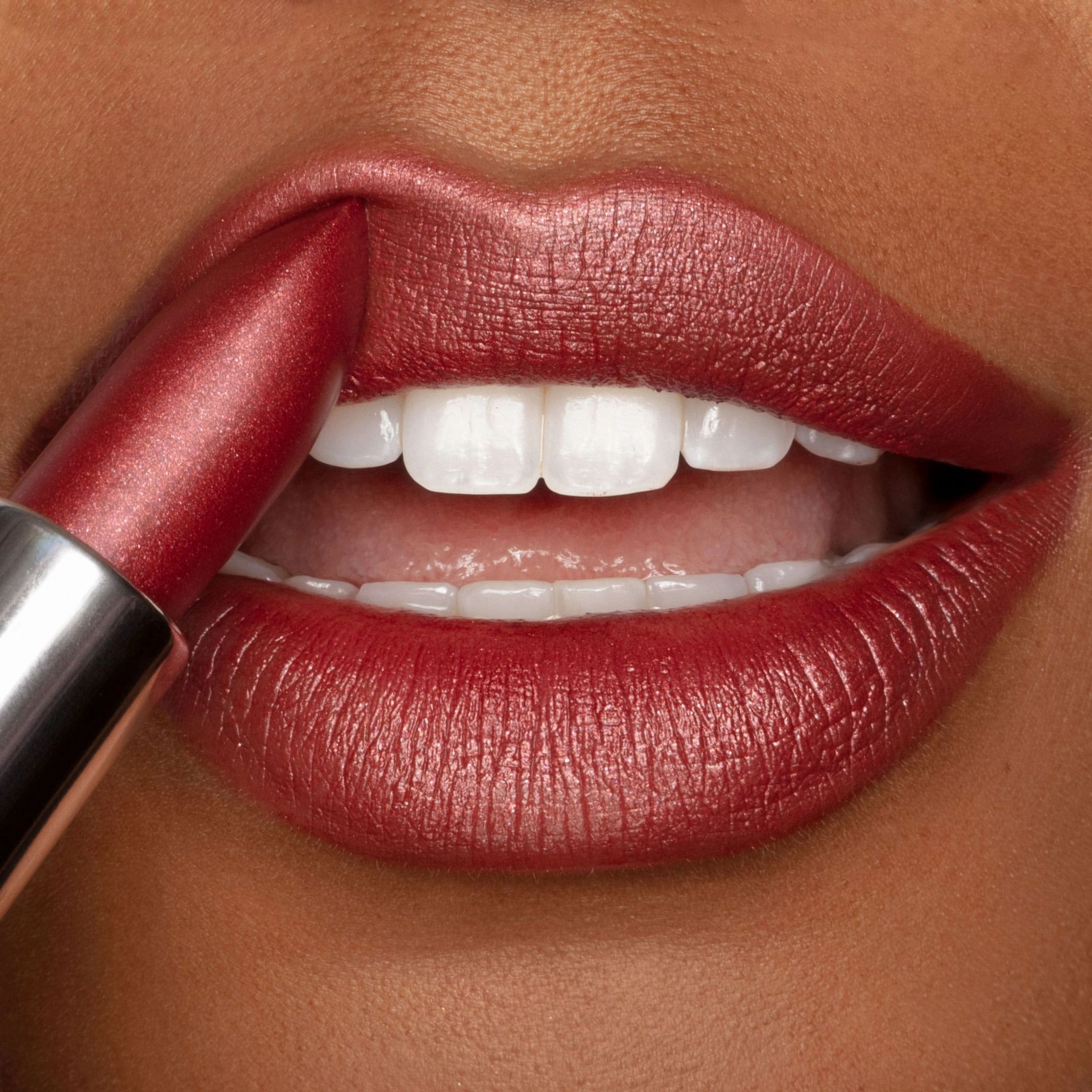 Ritzy Crme | A Warm Earthy Red with Gold Shimmer Lipstick