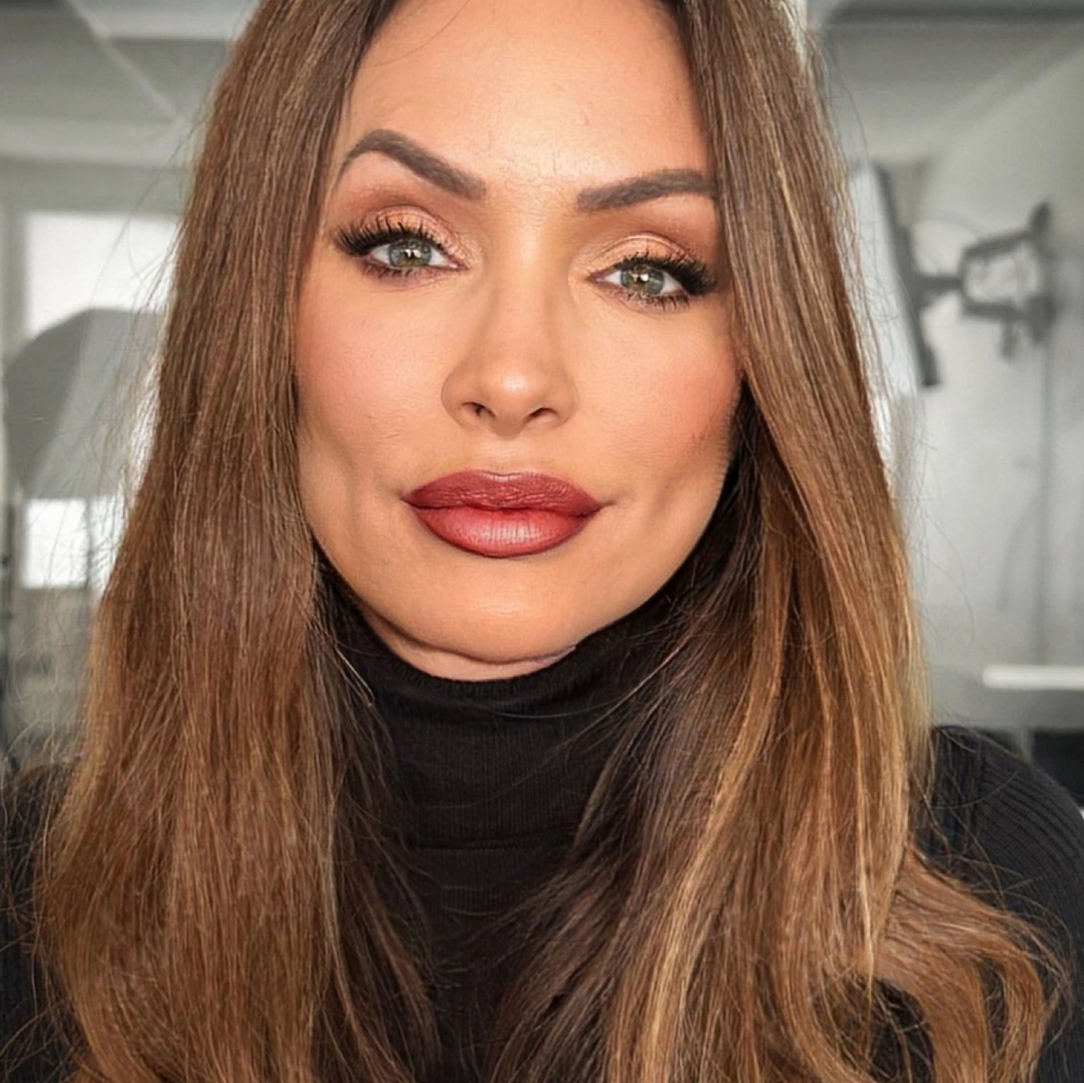 Ritzy Crme | A Warm Earthy Red with Gold Shimmer Lipstick